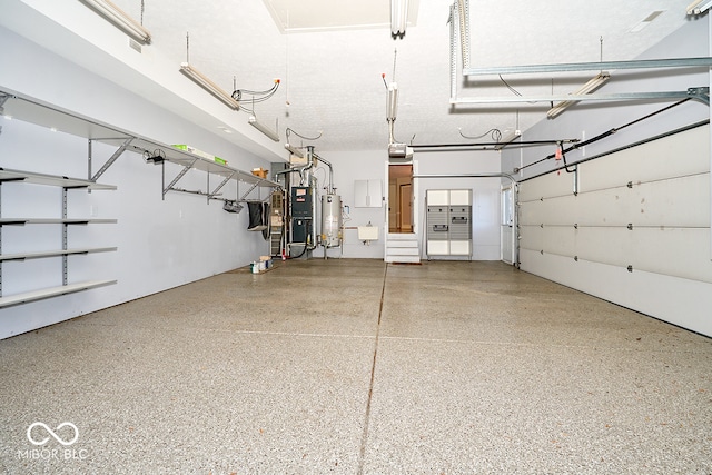 garage with sink and water heater