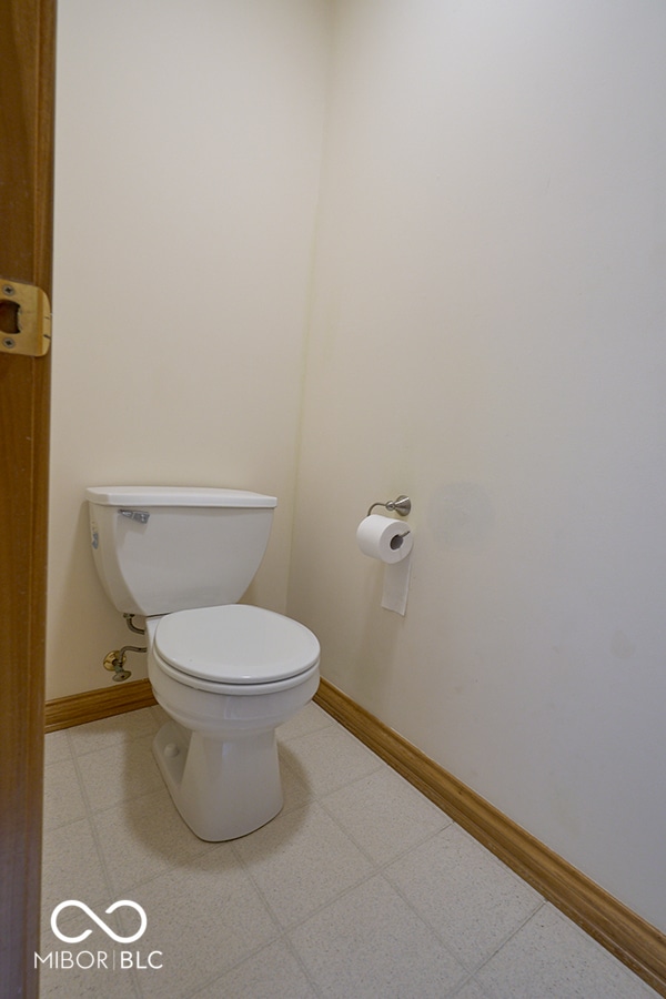 bathroom featuring tile patterned floors and toilet