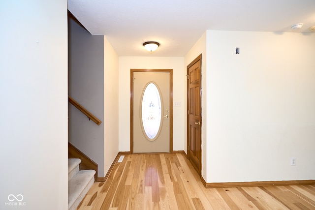 foyer entrance featuring light hardwood / wood-style flooring