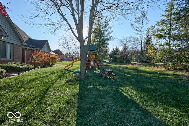 view of yard featuring a playground