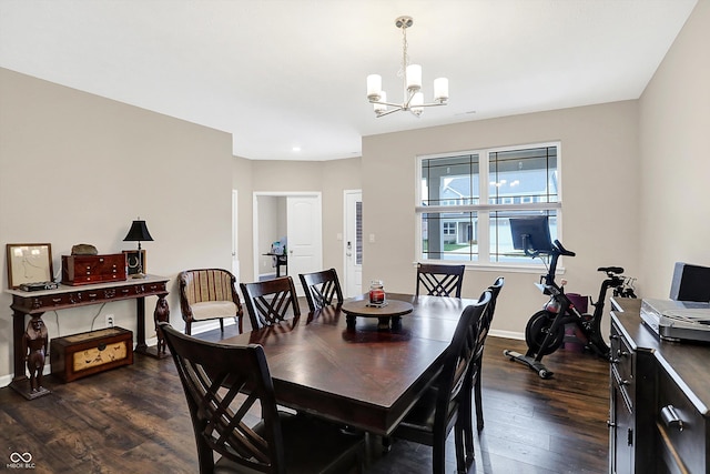 dining area with a chandelier and dark wood-type flooring