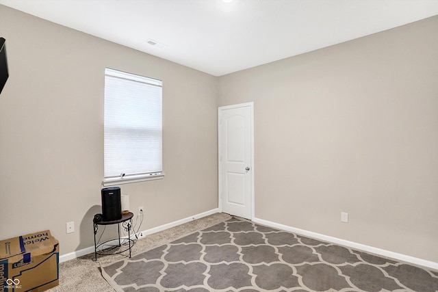 empty room featuring carpet floors