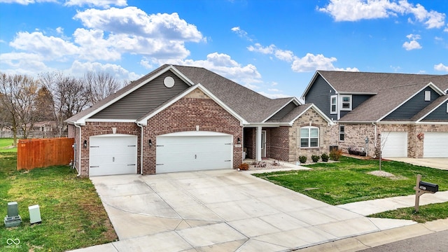 view of front facade with a front lawn and a garage