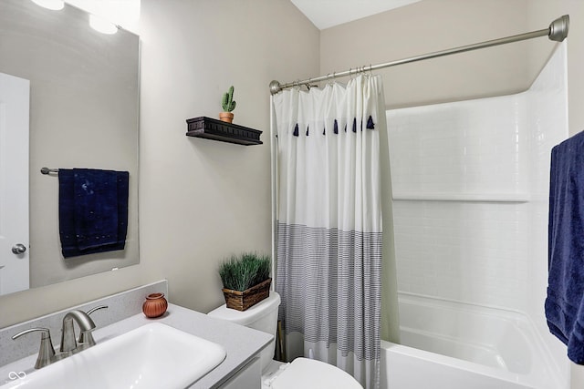 full bathroom featuring vanity, toilet, and shower / tub combo with curtain