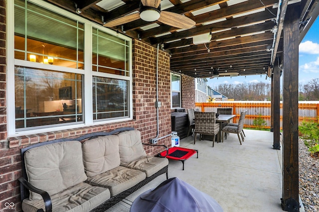 view of patio / terrace with ceiling fan and an outdoor hangout area