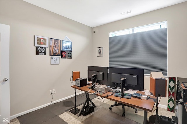 home office with concrete floors