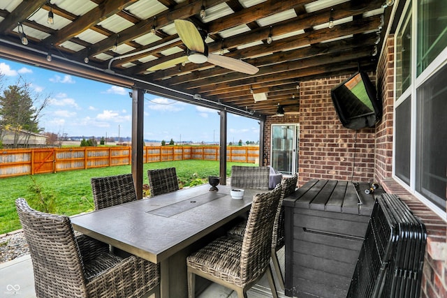 view of patio / terrace featuring ceiling fan