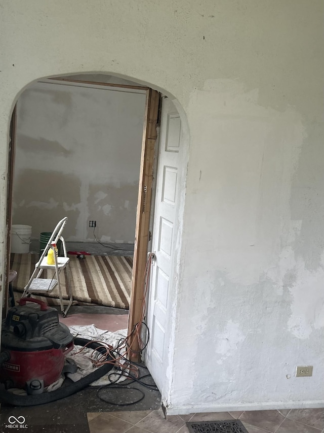 miscellaneous room with tile patterned floors