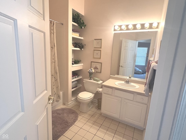 full bathroom featuring tile patterned floors, shower / tub combo with curtain, vanity, and toilet