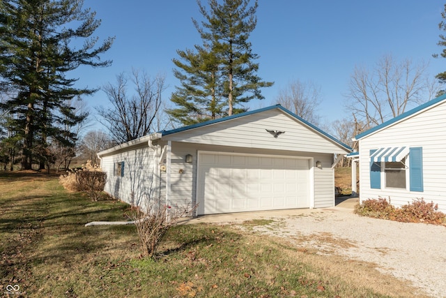 view of side of property featuring a yard