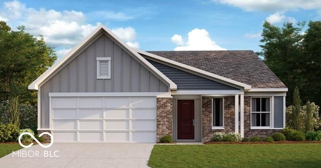 view of front of house featuring a garage and a front lawn