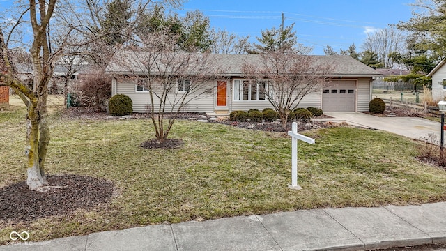 single story home with a shingled roof, a front yard, driveway, and an attached garage