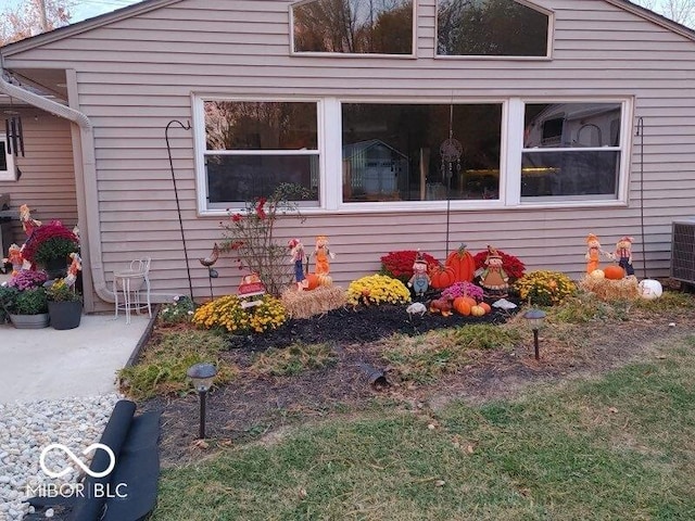 view of side of home with a patio area