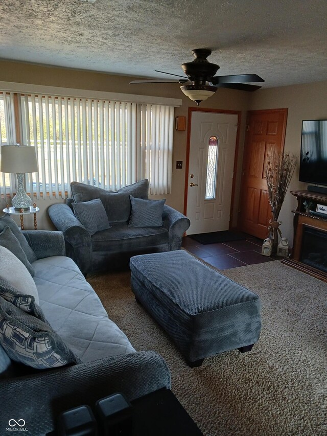 living room with a textured ceiling