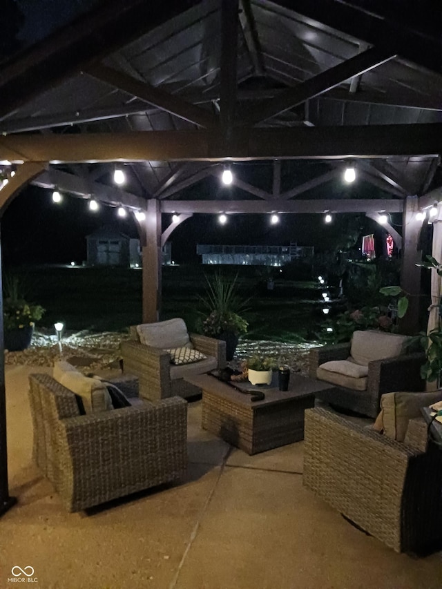 view of patio / terrace with a pergola, an outdoor hangout area, and a gazebo