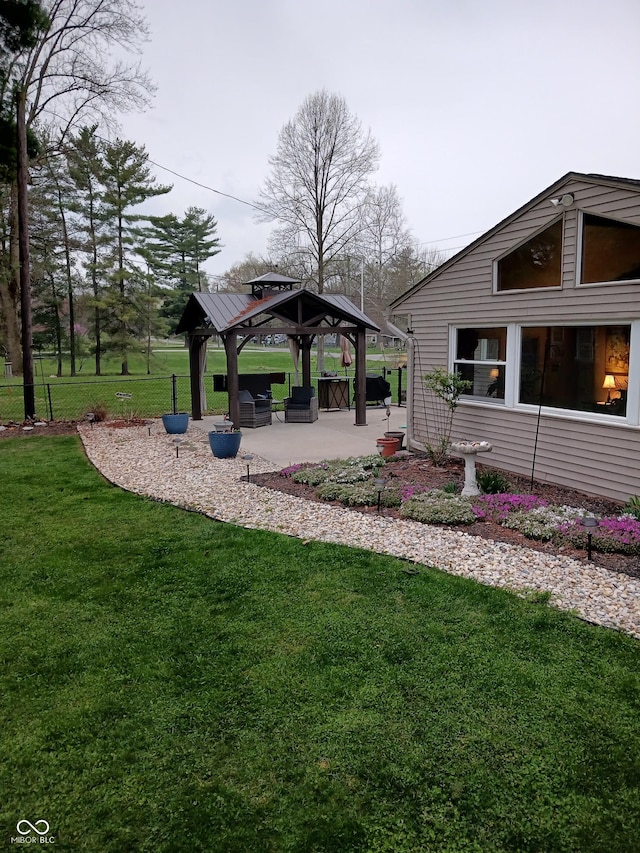 view of yard with a gazebo and a patio