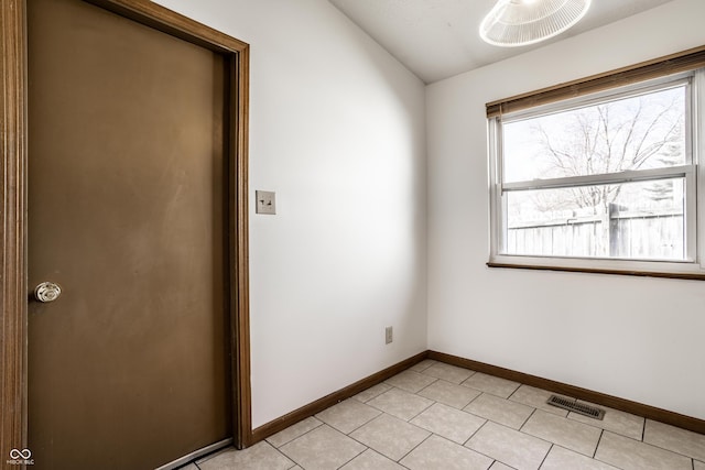 spare room with vaulted ceiling