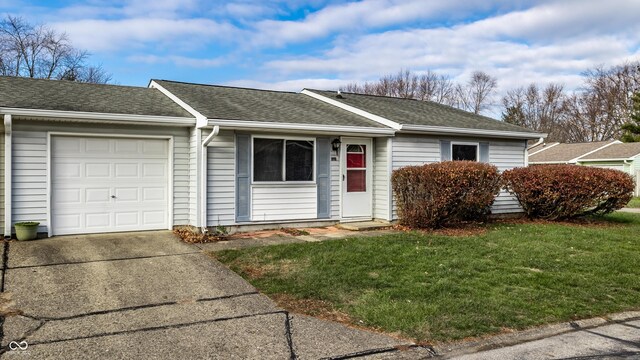 8016 Minlo Dr, Indianapolis, IN 46227 - ranch-style house with a garage, a shingled roof, a front yard, and driveway