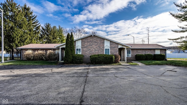 8016 Minlo Dr, Indianapolis, IN 46227 - view of front of house featuring brick siding