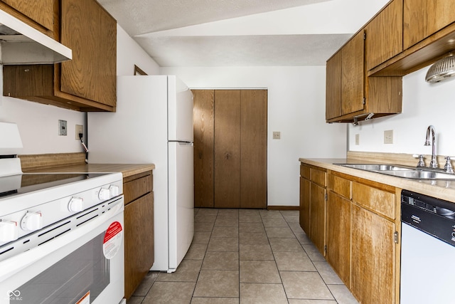 8016 Minlo Dr, Indianapolis, IN 46227 - kitchen featuring white appliances, under cabinet range hood, light countertops, and brown cabinetry