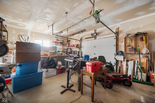 garage with a workshop area