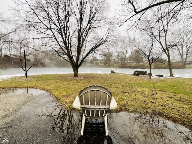 view of yard with a water view