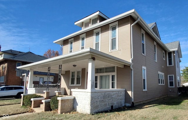 view of front of home featuring covered porch