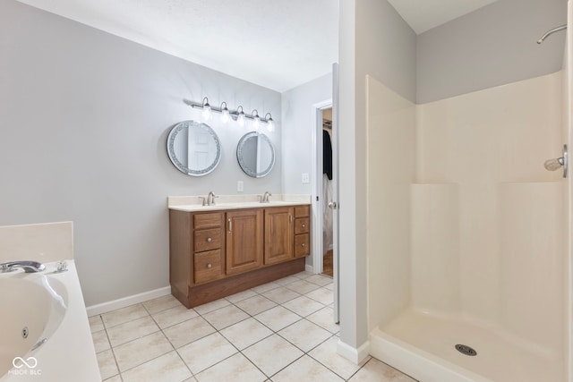 bathroom featuring tile patterned flooring, vanity, and independent shower and bath