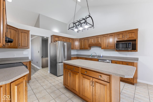 kitchen with a center island, sink, stainless steel appliances, high vaulted ceiling, and light tile patterned flooring