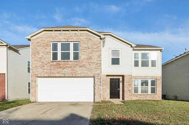 view of front of property with a garage and a front yard