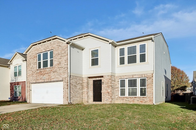 view of front of property with a garage and a front yard