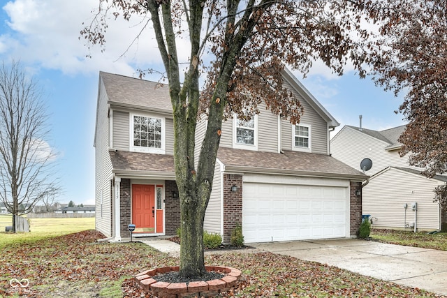 front of property featuring a garage