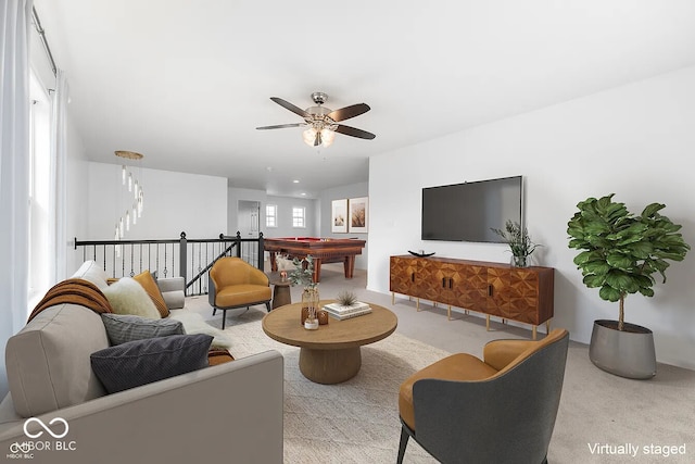 living room with ceiling fan, light carpet, and billiards