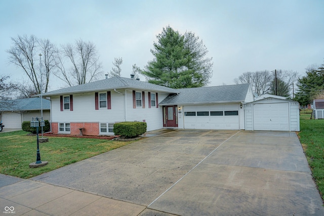 split level home featuring an outbuilding and a front lawn