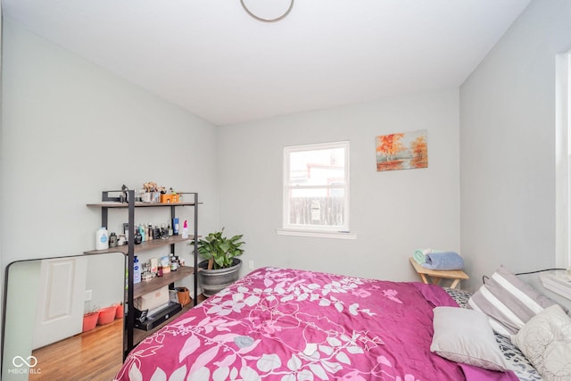 bedroom featuring hardwood / wood-style floors