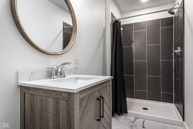 bathroom with a shower with shower curtain and vanity