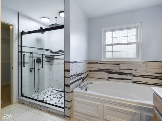 bathroom with vanity, separate shower and tub, and tile patterned floors