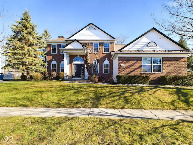 view of front of home with a front lawn