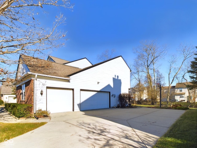 view of property exterior with a garage