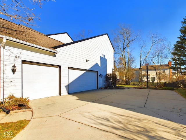 view of home's exterior with a garage