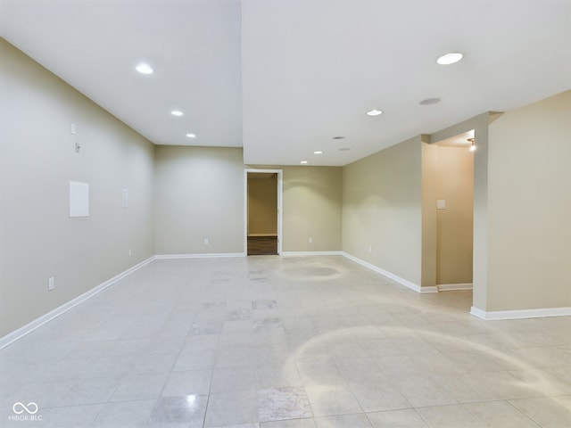 spare room featuring light tile patterned floors