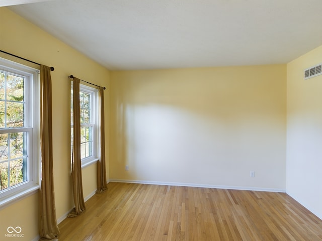 empty room with light wood-type flooring