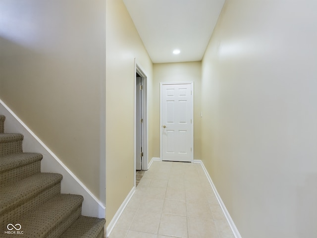 hallway with light tile patterned floors