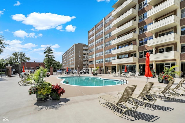 view of swimming pool featuring a patio area