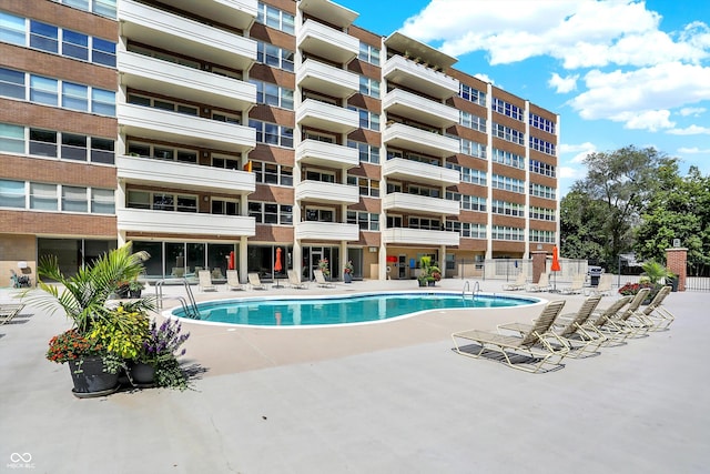 view of pool featuring a patio area