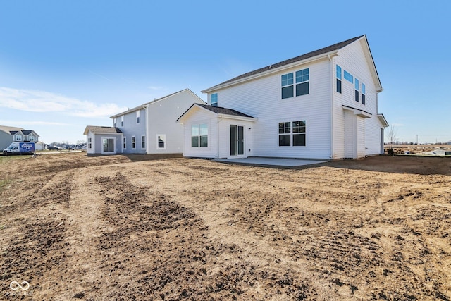 rear view of property with a patio area