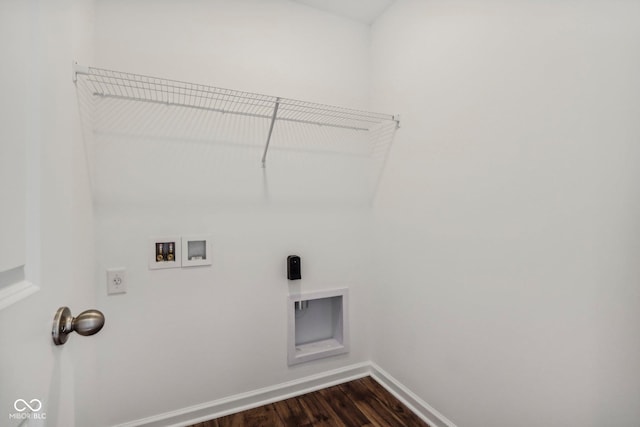 clothes washing area with electric dryer hookup, dark wood-type flooring, and washer hookup