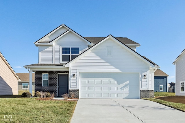 view of front of home with a front yard and a garage