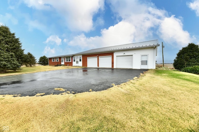 garage featuring a yard