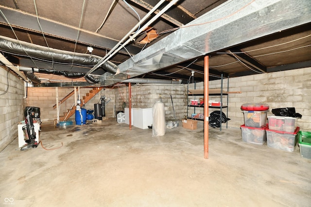 basement featuring washer and clothes dryer